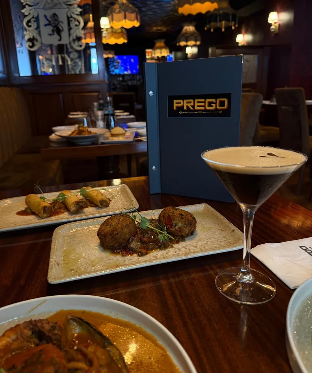 Cocktail and dishes at Prego Bar & Grill